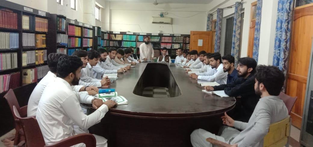 Students conducting legal research in the Mardan Law College library
